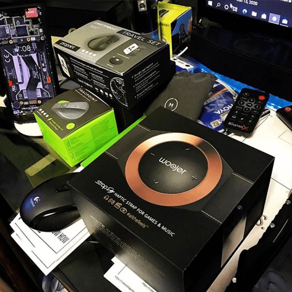 Woojer unboxing on a customer desk