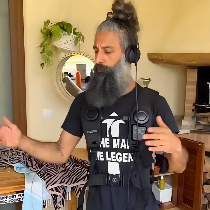 Woojer customer at home wearing the unit